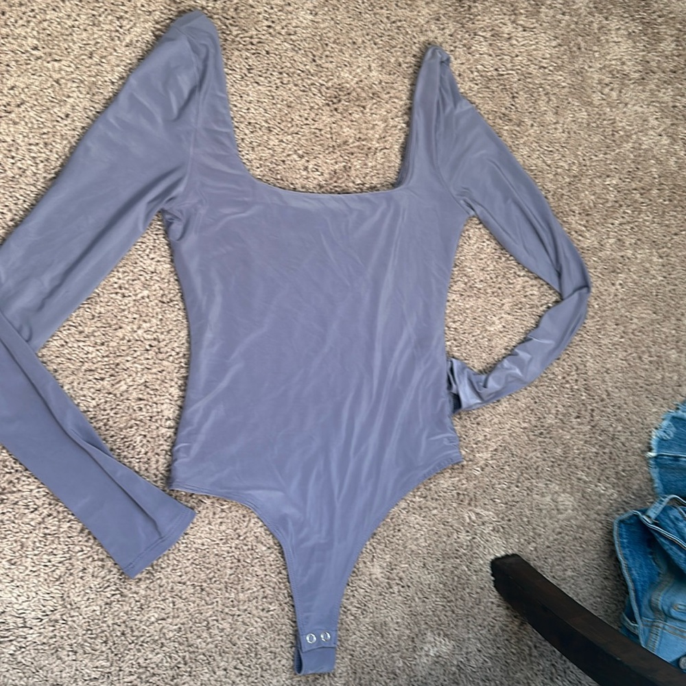 Purple body suit